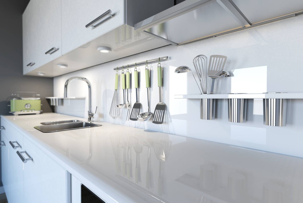 A clean kitchen with wall racks and shelves for kitchen tools near Lexington, South Carolina (SC)